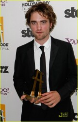 Rob Accepts Award